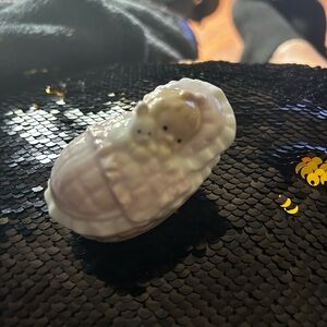 Vintage porcelain baby in a basket trinket